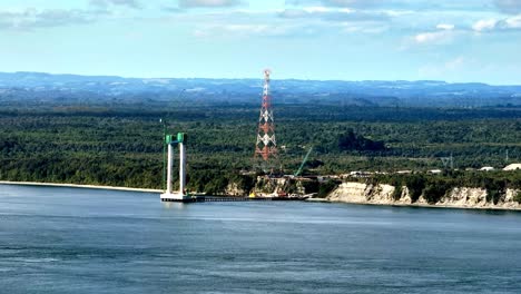 aerial-video-of-the-pillar-on-the-mainland-side,-of-the-construction-of-the-Chacao-bridge-in-the-Chacao-canal