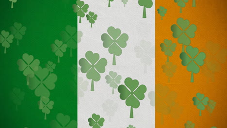 digital animation of multiple clover leaves floating against irish flag