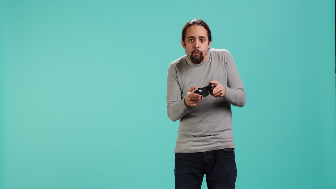 Portrait of upbeat person playing intense gaming console game