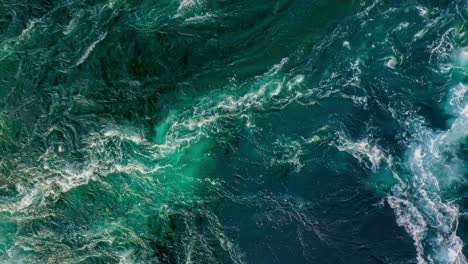 waves of water of the river and the sea meet each other during high tide and low tide.