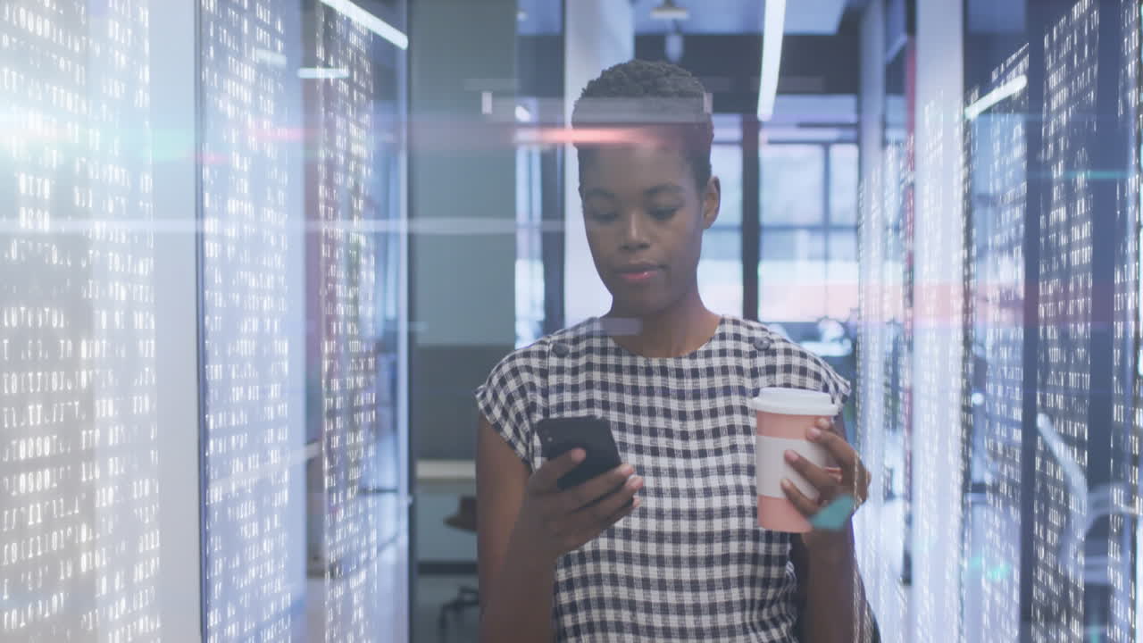 Animation of lights over african american women in server room