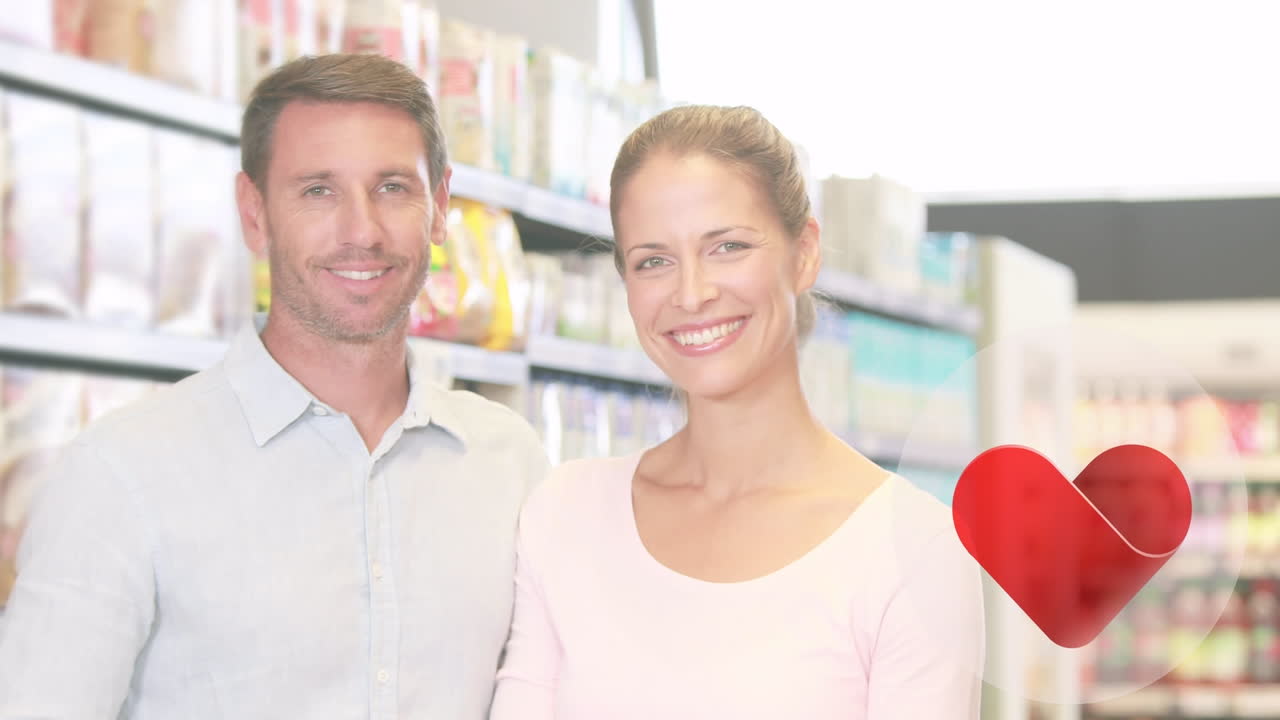 가게에 있는 백인 부부 위에 떨어지는 심장 아이콘의 애니메이션