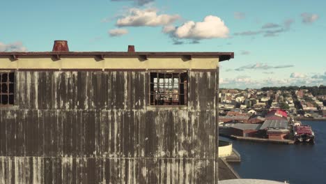 aerial peep in the broken window of the massive abandoned grain terminal in brooklyn new york city