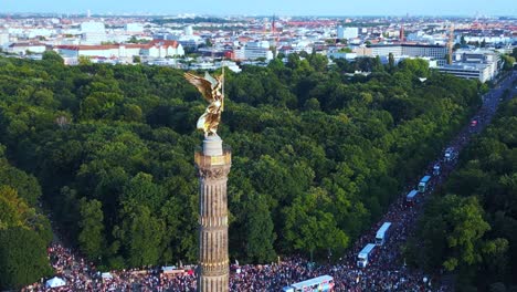 love parade berlin city, lovely aerial top view flight csd pride parade 2023 germany summer evening victory column