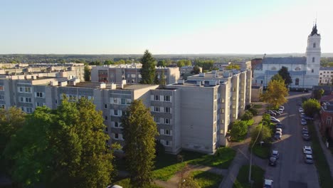 apartment buildings and church of daugavpils, aerial drone view