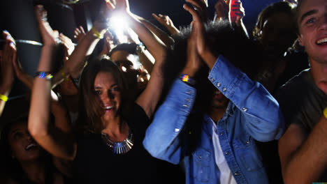 Group-of-people-dancing-at-a-concert-4k