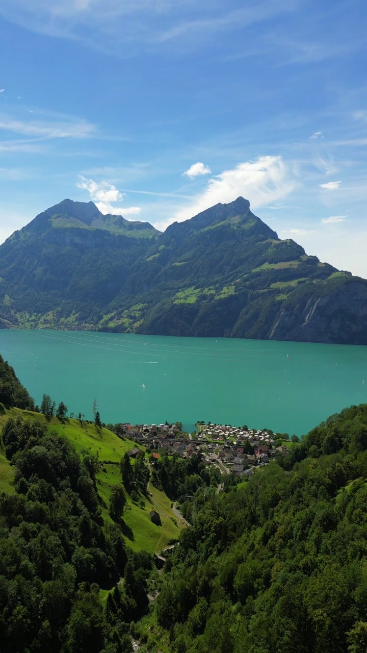 Urnersee the southeastern part of Lake Lucerne, in Switzerland aerial drone vertical video