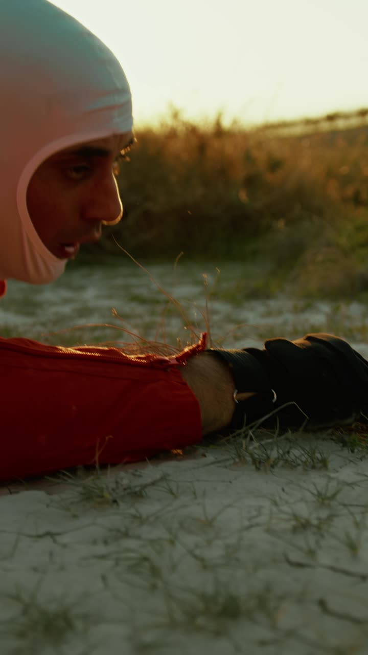 Astronaut Crawls On The Ground Suffocating On A Planet With Poisonous Air