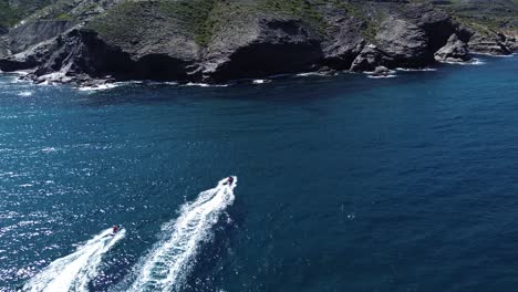 jet ski sailing at seascape in the south coast of spain aerial drone view