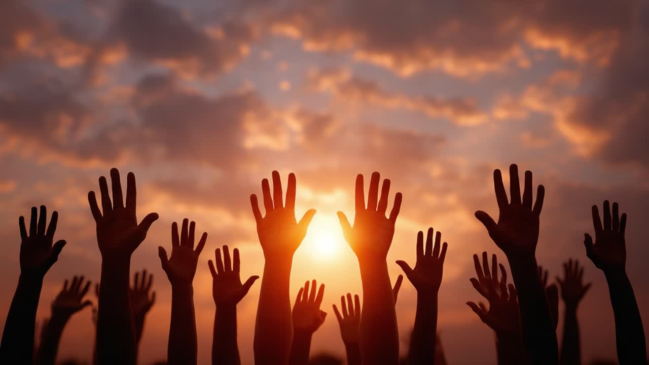 A Powerful Display of Hope and Unity: Silhouetted Hands Reaching Towards a Golden Sunset Sky, Signifying Aspiration, Community, and Togetherness in a Beautiful Moment