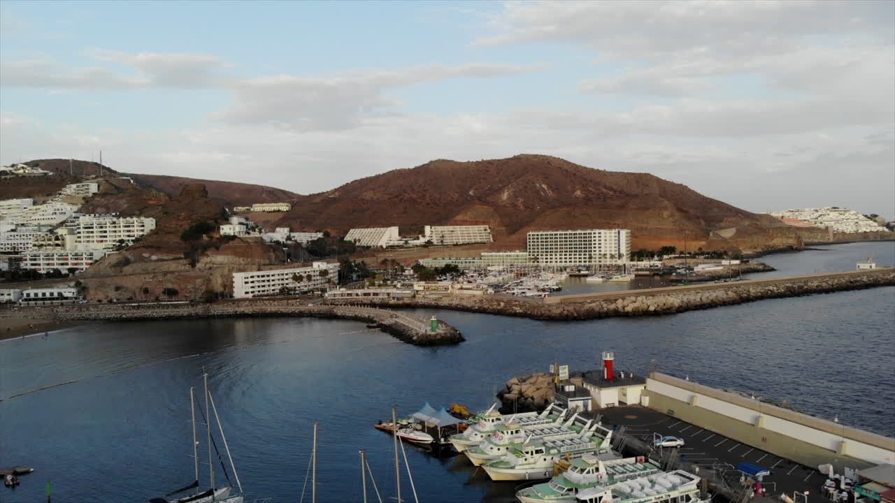 Sailboats And Yachts Moored At The Port Of Las Palmas In Gran Canaria, Canary Islands, Spain - aerial drone