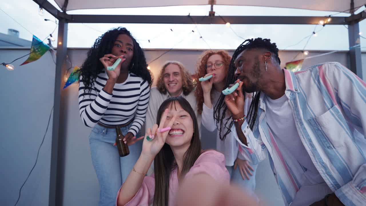 Friends celebrating on a rooftop