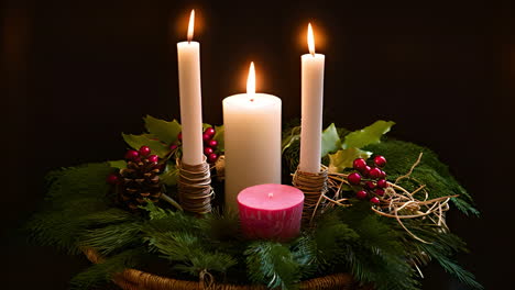 a beautiful basket filled with candles and greenery