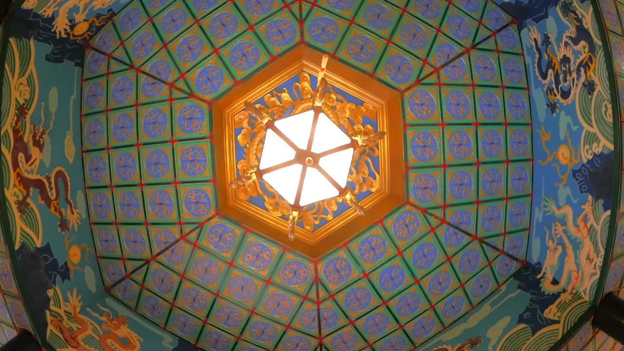 Colorful, old, and intricate Chinese designed ceiling tray.