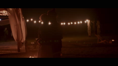 couple dancing under the lights