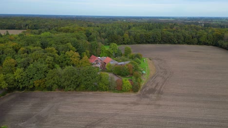 aerial view of farmhouse in rural landscape