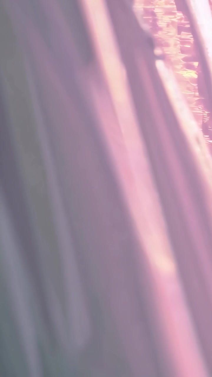 Abstract Background of Soft Pink Fabric Moving in Wind