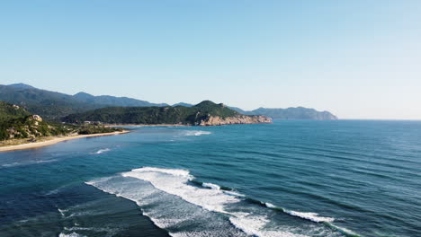 Calm-waves-on-paradise-tropical-coast-in-Hang-Rai,-Vietnam,-aerial-view