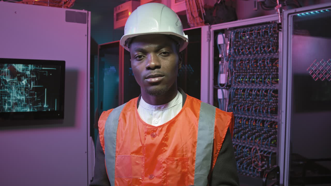 Portrait of African-American Technician in Data Center
