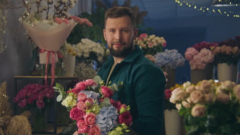 florist with a bouquet of flowers in a flower shop
