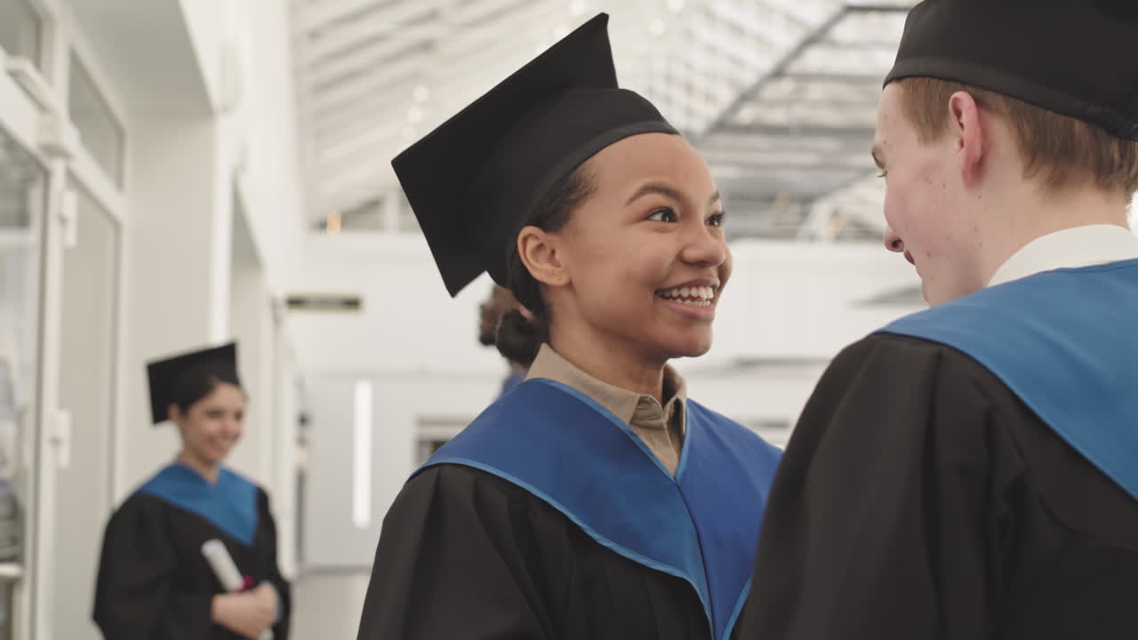 Happy Diverse Friends Congratulating Each Other on Graduation