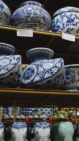 shelves filled with various ceramic items.