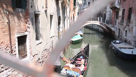 charming venice canal with bridge and colorful old buildings.