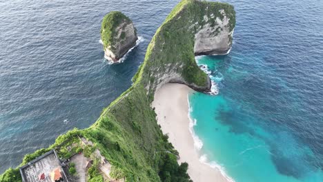 kelingking beach nusa penida - aerial footage - indonesia