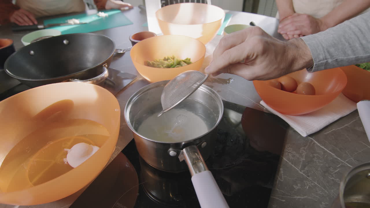 Cooking Poached Egg During Cooking Class