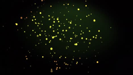 Animation-of-warm-glowing-yellow-spots-on-green-background