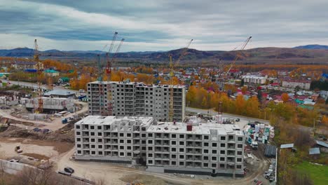 construction site of a multi-story residential building in a city