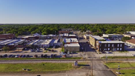 Side-flight-over-Royse-City,-TX