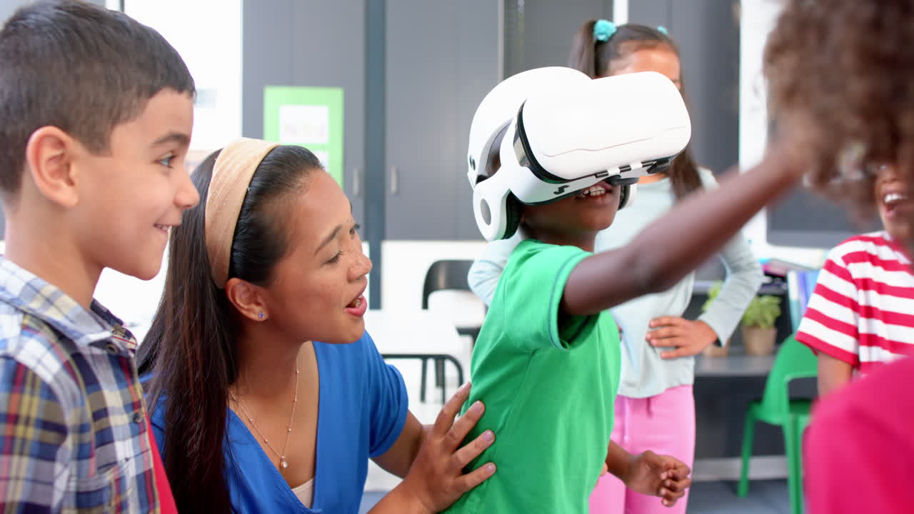 In school, children using VR headset with teacher guiding them in classroom