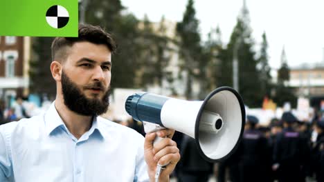 man at political meeting with banner with points for tracking to copy space text