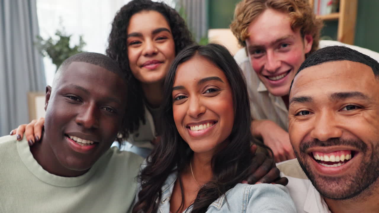 Group of diverse friends taking a selfie and smiling