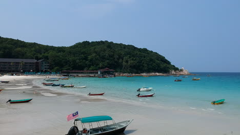 paradise beach turquoise water perhentian island malaysia costal rocks drone