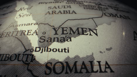 close-up of a world globe focusing on yemen and surrounding countries