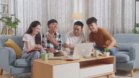 group of students studying together at home