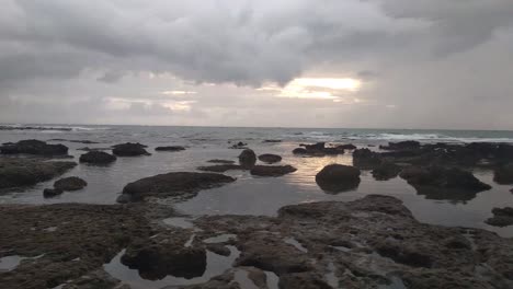 The-Rancabuaya-beach-scenery-at-sunset-dusk-sky,-Garut,-West-Java,-Indonesia