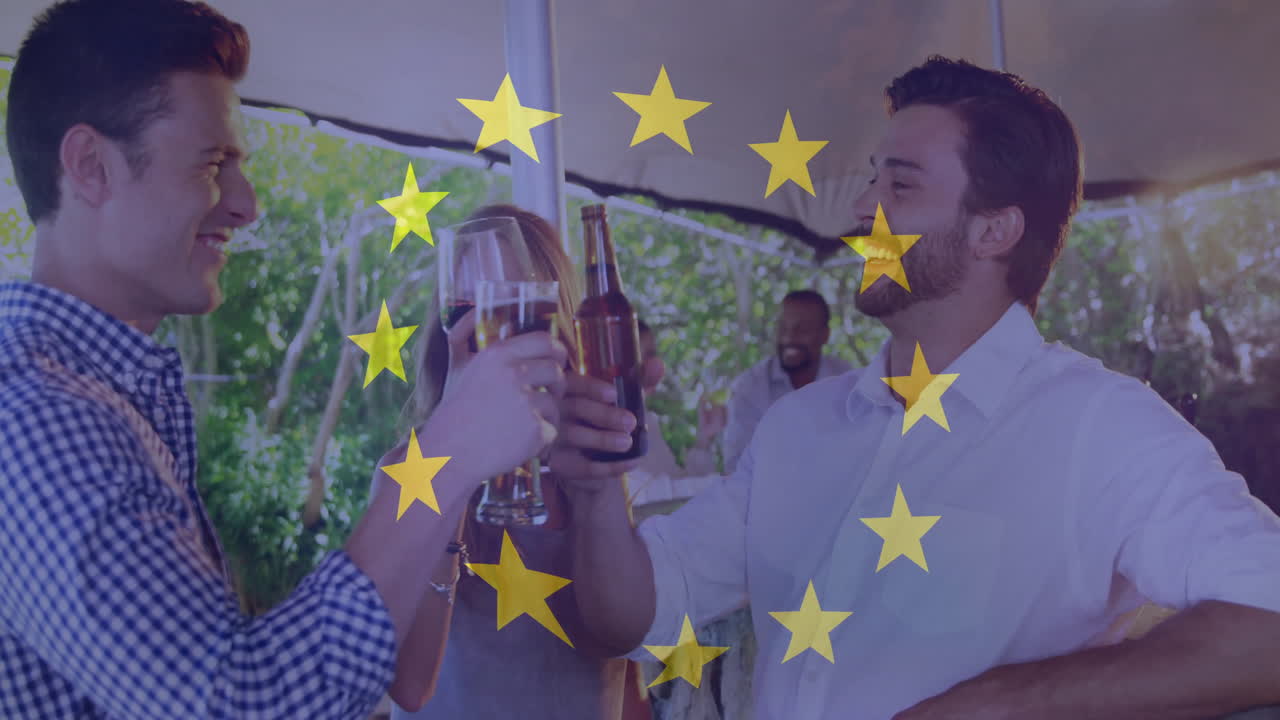 friends toasting drinks under canopy featuring animated yellow star overlay for marketing