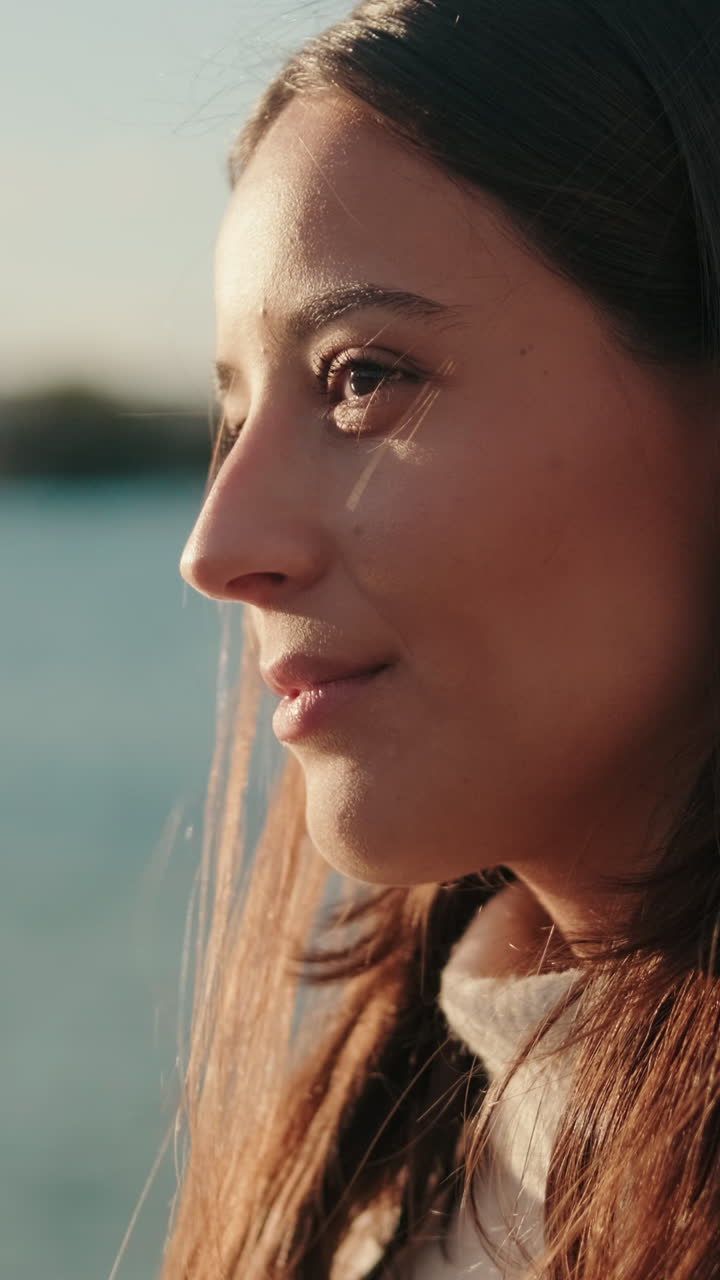 Woman Enjoying Sunset By The River In Seville