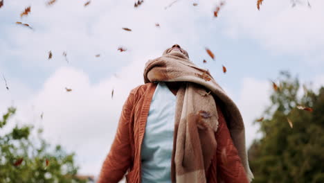 Leaves,-senior-woman-and-throw-in-air-in-autumn