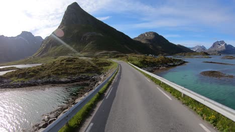 driving a car on a road in norway lofoten. fredvang bridges lofoten islands.