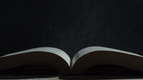 open book with water droplets
