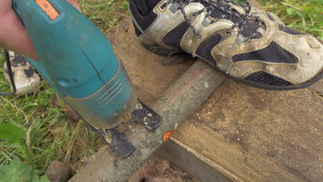 Cutting-the-timber-with-electric-jigsaw