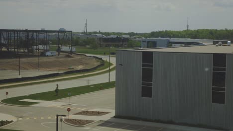 distant view from business area of traffic build-up on the highway on a sunny day