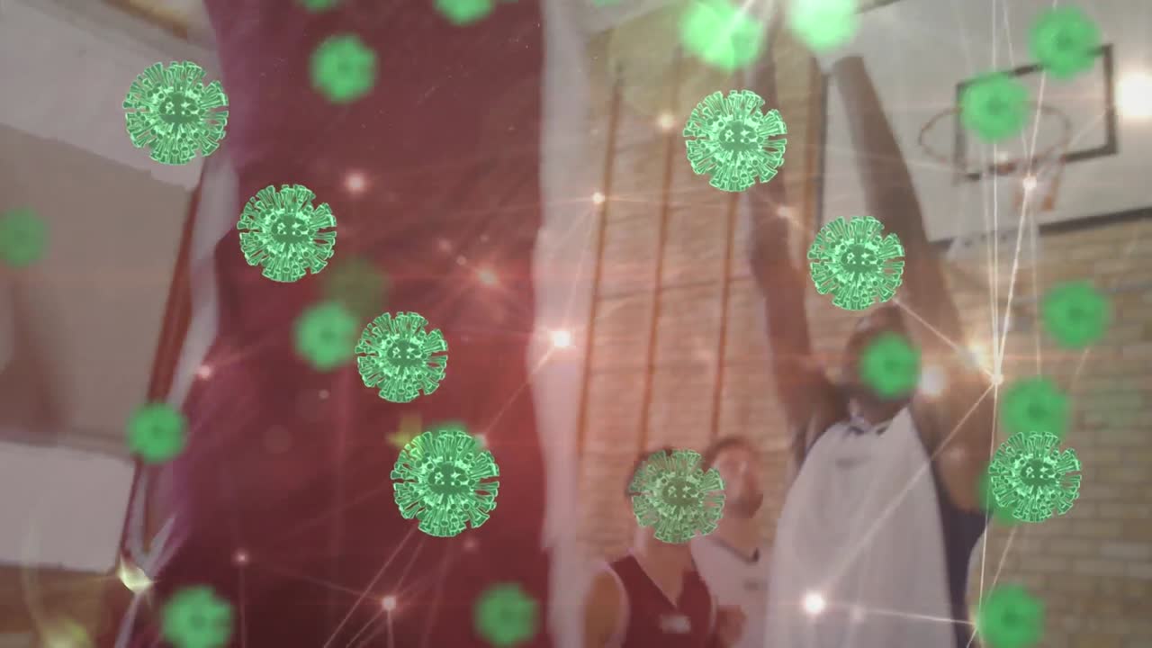 animación de células de virus y red de conexiones en un grupo diverso de jugadores de baloncesto en el gimnasio