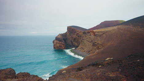 panoramic wide shot of capelinhos volcanic coastline