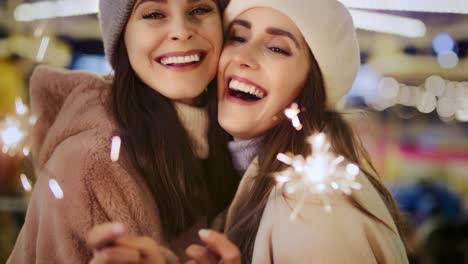 Video-of--friends-with-sparklers-on-Christmas-market.