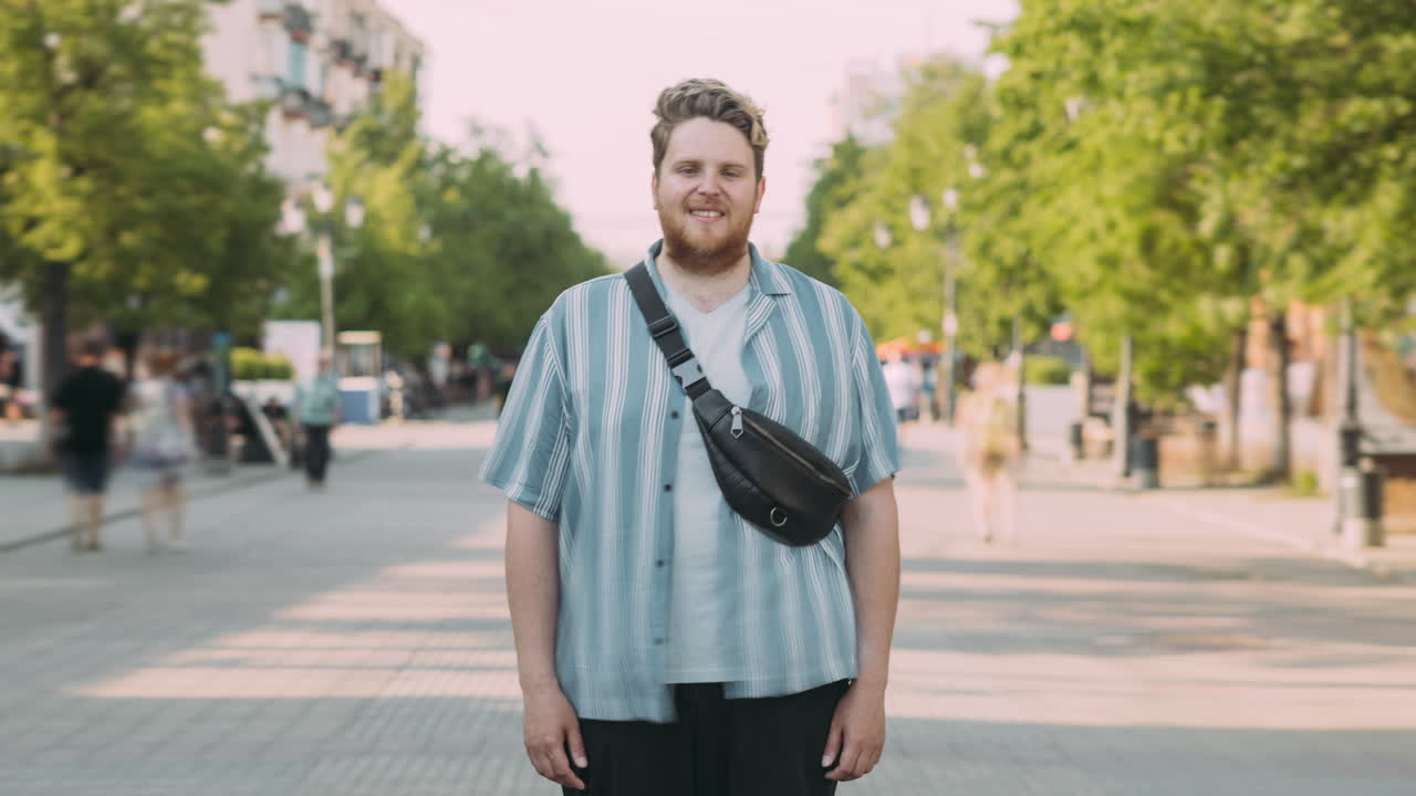 Man Standing on City Street